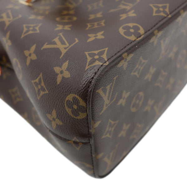 LOUIS VUITTON Neonoe BB Monogram Shearling Trimmed Bucket Bag Brown