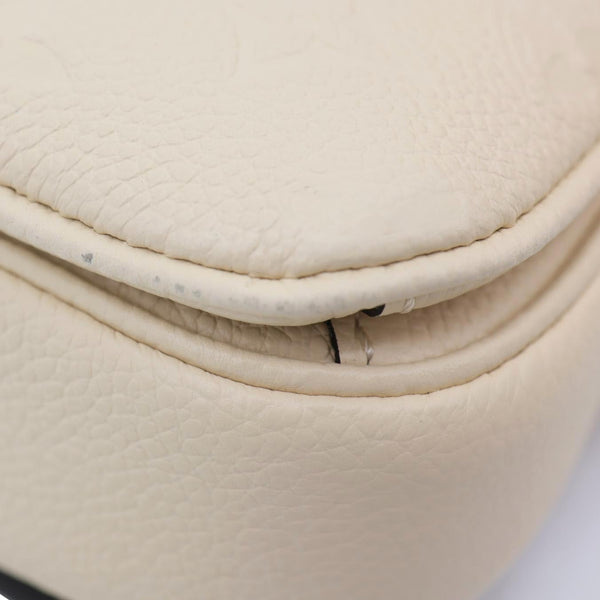 LOUIS VUITTON Metis East West Pochette Empreinte Leather Crossbody Bag Cream