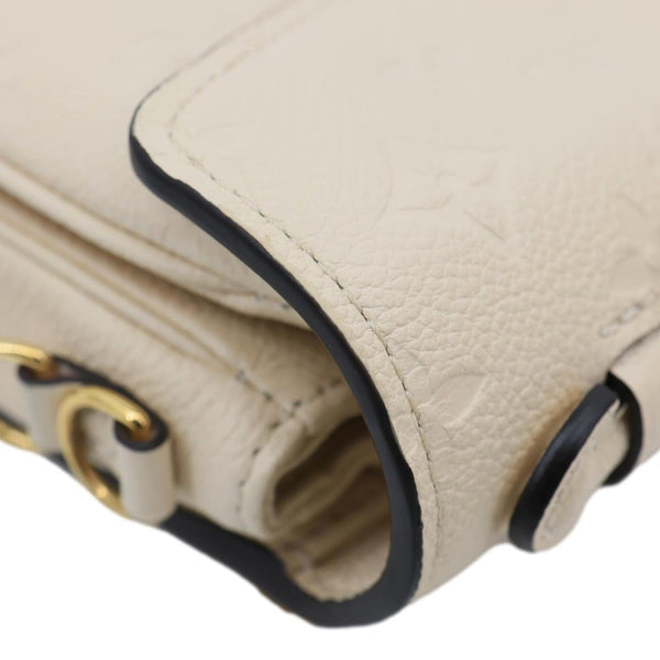 LOUIS VUITTON Metis East West Pochette Empreinte Leather Crossbody Bag Cream