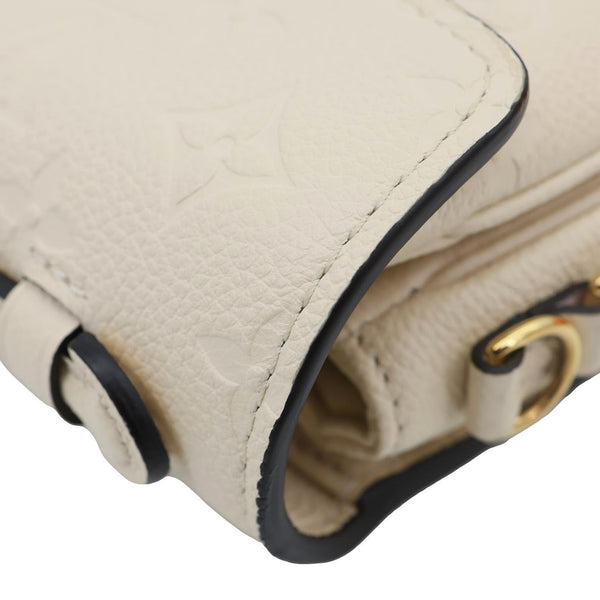 LOUIS VUITTON Metis East West Pochette Empreinte Leather Crossbody Bag Cream