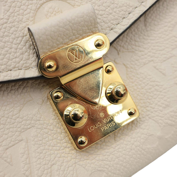 LOUIS VUITTON Metis East West Pochette Empreinte Leather Crossbody Bag Cream