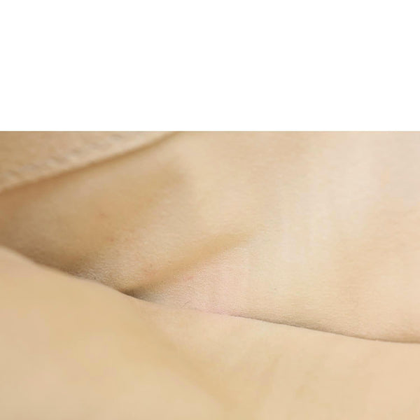 LOUIS VUITTON Metis East West Pochette Empreinte Leather Crossbody Bag Cream