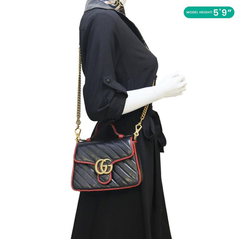 Gucci GG Marmont Mini Top Handle Black Crossbody Bag - Model Carrying