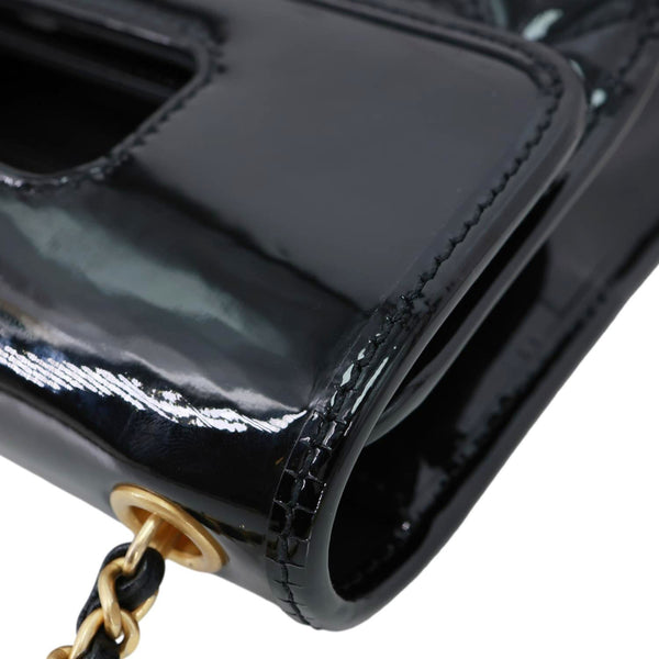 CHANEL Graphic Catch Flap Mini Quilted Patent Leather Shoulder Bag Black