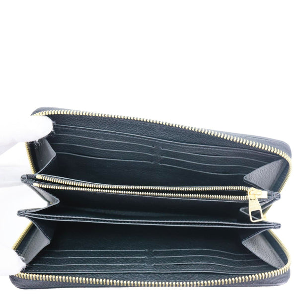 LOUIS VUITTON Monogram Empreinte Leather Zippy Wallet Bicolor