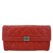 CHANEL Boy Flap Quilted Caviar Leather Wallet Red