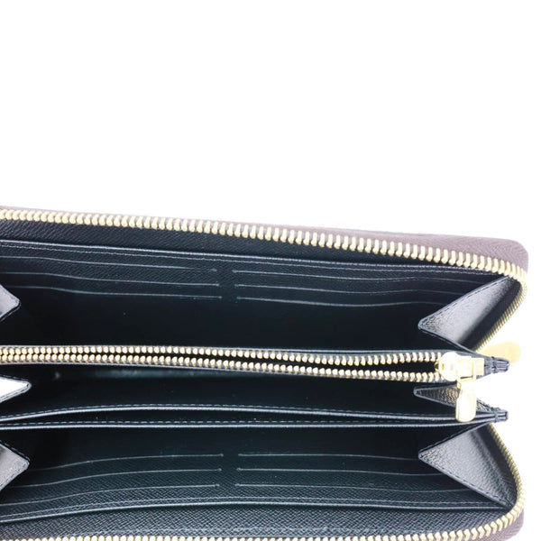 LOUIS VUITTON Giant Monogram Reverse Zippy Wallet Brown