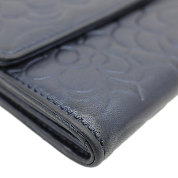 CHANEL Camellia Gusset Flap Embossed Lambskin Leather Wallet Navy Blue