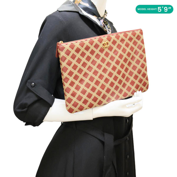 CHANEL Stitched O Case Calfskin Leather Clutch Red