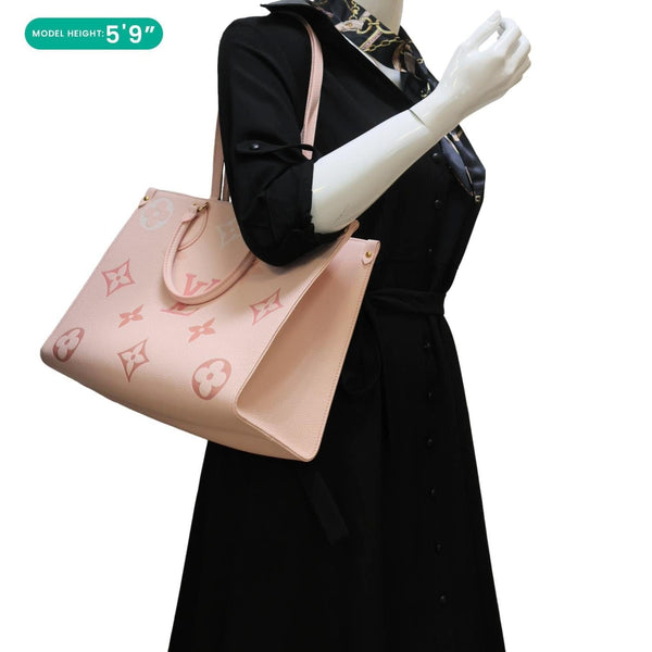 LOUIS VUITTON Onthego MM Giant Monogram Empreinte Leather Tote Bag Pink