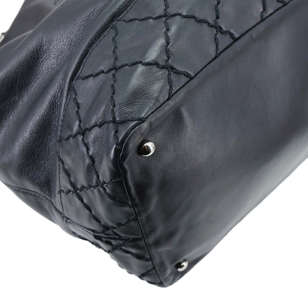 CHANEL Surpique CC Drawstring Calfskin Leather Bucket Bag Black