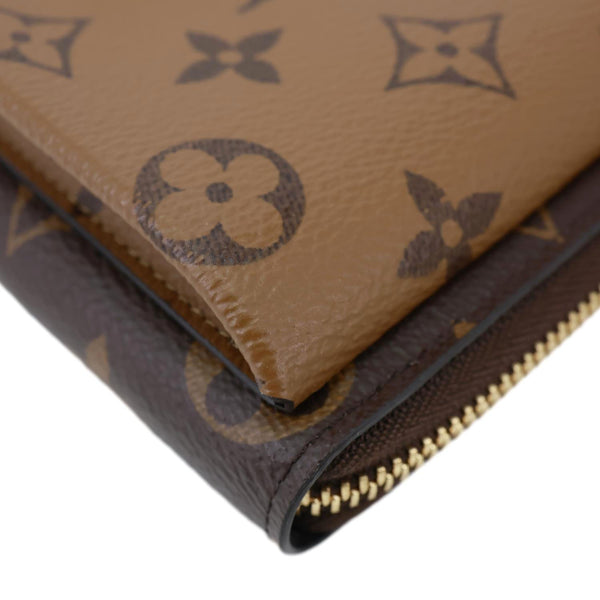 LOUIS VUITTON Metis Reverse Monogram Canvas Vertical Zippy Chain Wallet Brown