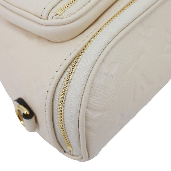 LOUIS VUITTON Mini Monogram Empreinte Leather Bumbag Cream