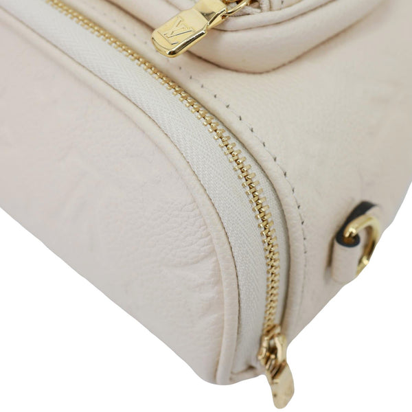 LOUIS VUITTON Mini Monogram Empreinte Leather Bumbag Cream