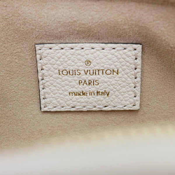 LOUIS VUITTON Mini Monogram Empreinte Leather Bumbag Cream