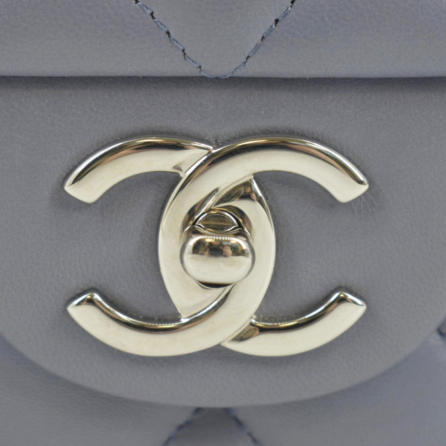 Chanel Classic Maxi Double Flap Quilted Lambskin Leather Shoulder Bag Light Purple