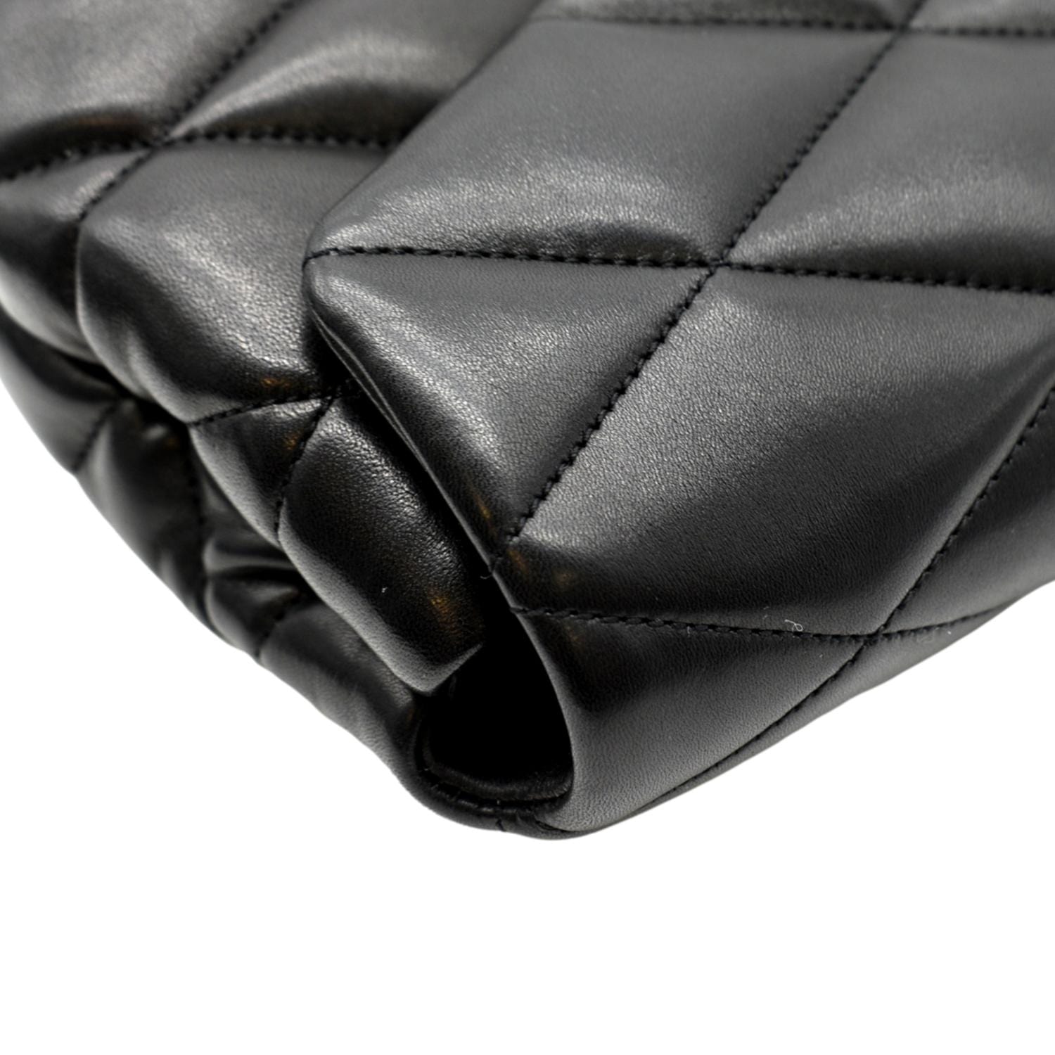 Quilted black leather clutch bag