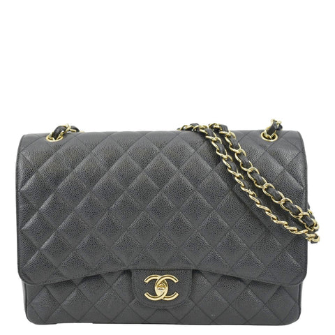 A BLACK LAMBSKIN LEATHER MAXI SINGLE FLAP BAG WITH GOLD HARDWARE, CHANEL,  1991-1994