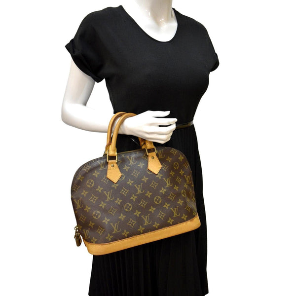 LOUIS VUITTON Alma  Monogram Canvas Satchel Crossbody Bag Brown