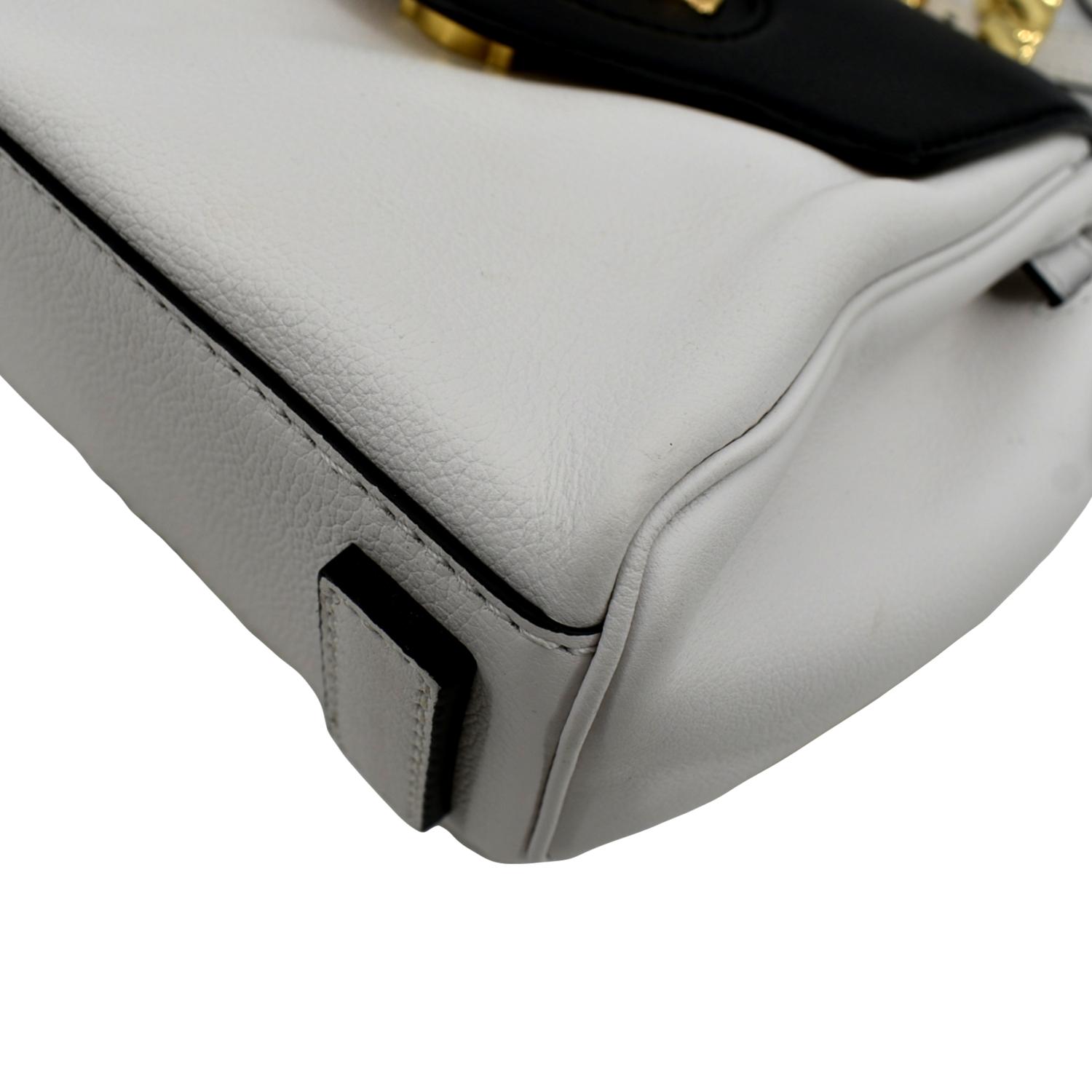 Handling it with care - the La Medusa Top Handle Bag from Versace.  Impeccable service, every time. #AmericanaManhasset