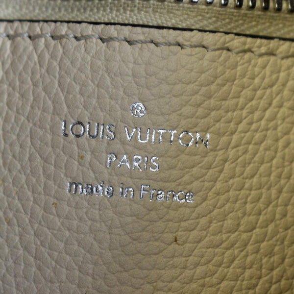 LOUIS VUITTON Muria Mahina Perforated Leather Crossbody Bag Creme