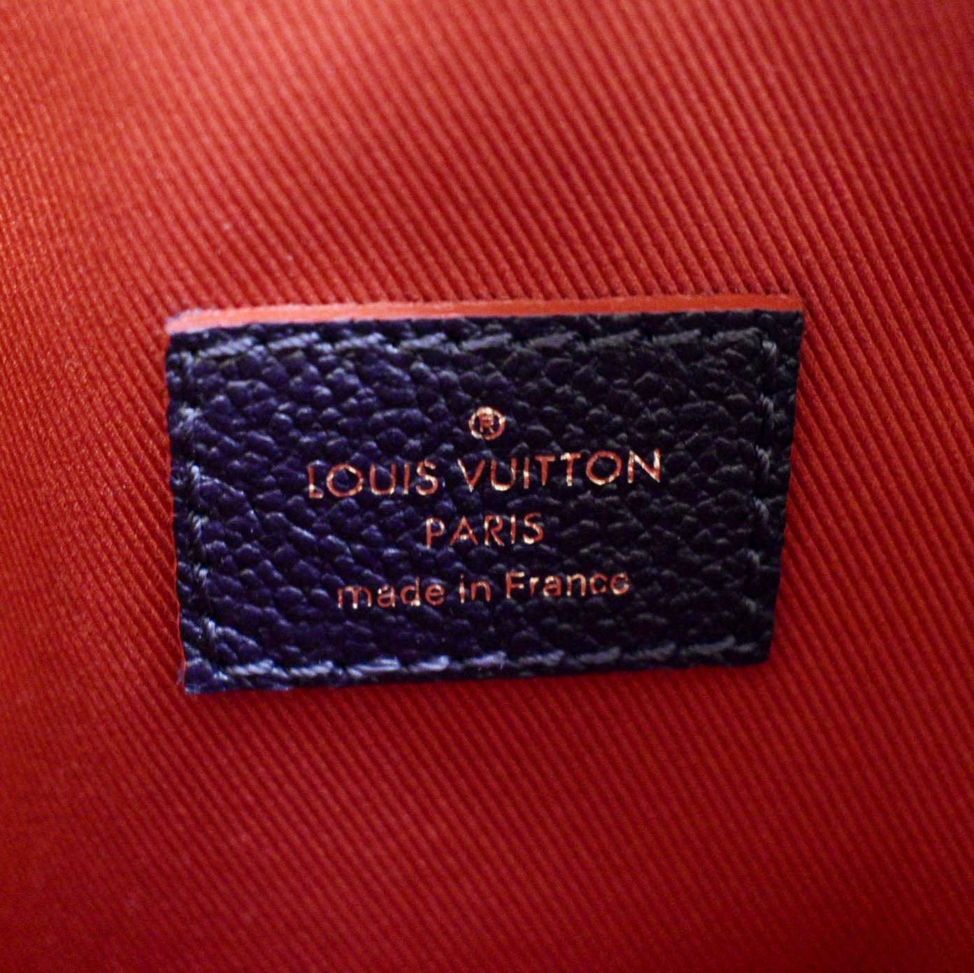 lv leather tag
