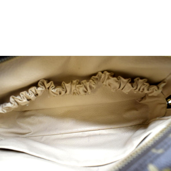 LOUIS VUITTON Trousse Toilette 23 Monogram Canvas Cosmetic Pouch Brown