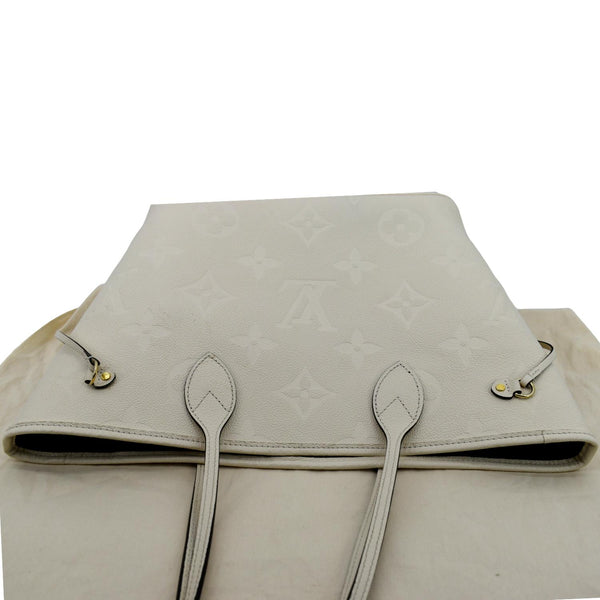 Louis Vuitton Neverfull MM Monogram Empreinte Tote Bag in Beige color - Top 