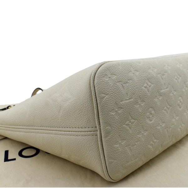 Louis Vuitton Neverfull MM Monogram Empreinte Tote Bag in Beige color - Bottom Left
