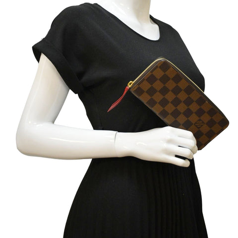 LOUIS VUITTON Clemence Damier Ebene Zippy Wallet Brown