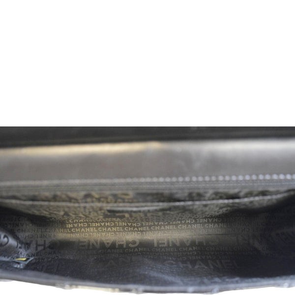 CHANEL Through Flap Quilted Patent Leather Shoulder Bag Black