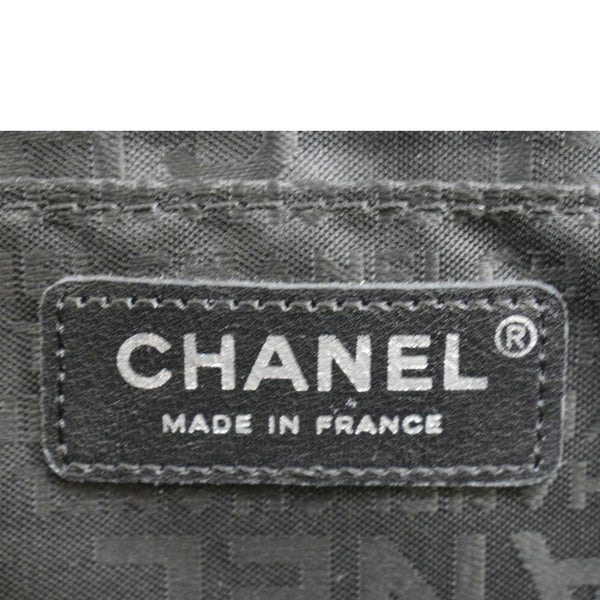 CHANEL Through Flap Quilted Patent Leather Shoulder Bag Black