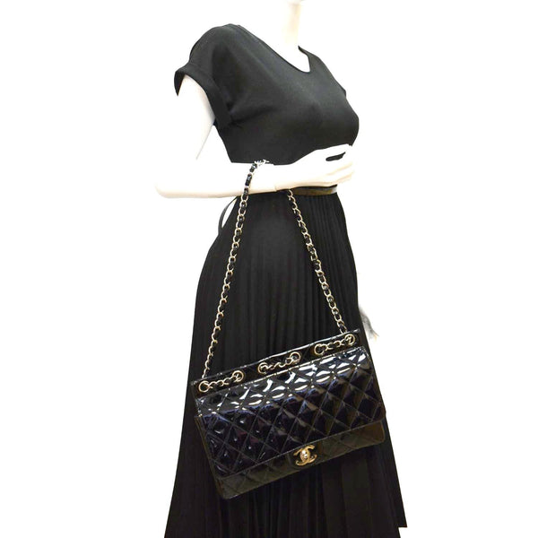 CHANEL Through Flap Quilted Patent Leather Shoulder Bag Black
