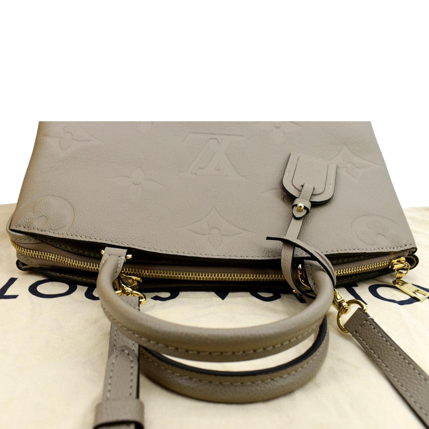 strap monogram empreinte leather wallets