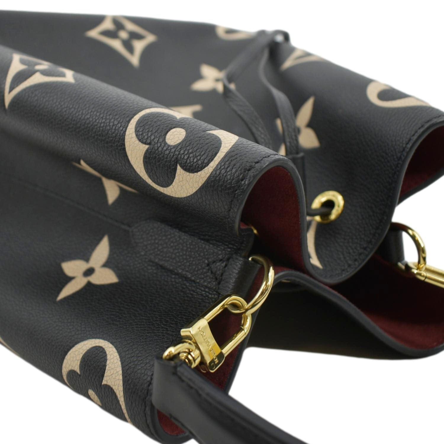 Louis Vuitton Bi-Color Dove/Cream Monogram Empreinte Leather NeoNoe Bag -  Yoogi's Closet