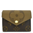 LOUIS VUITTON Zoe Monogram Reverse Canvas Wallet Brown