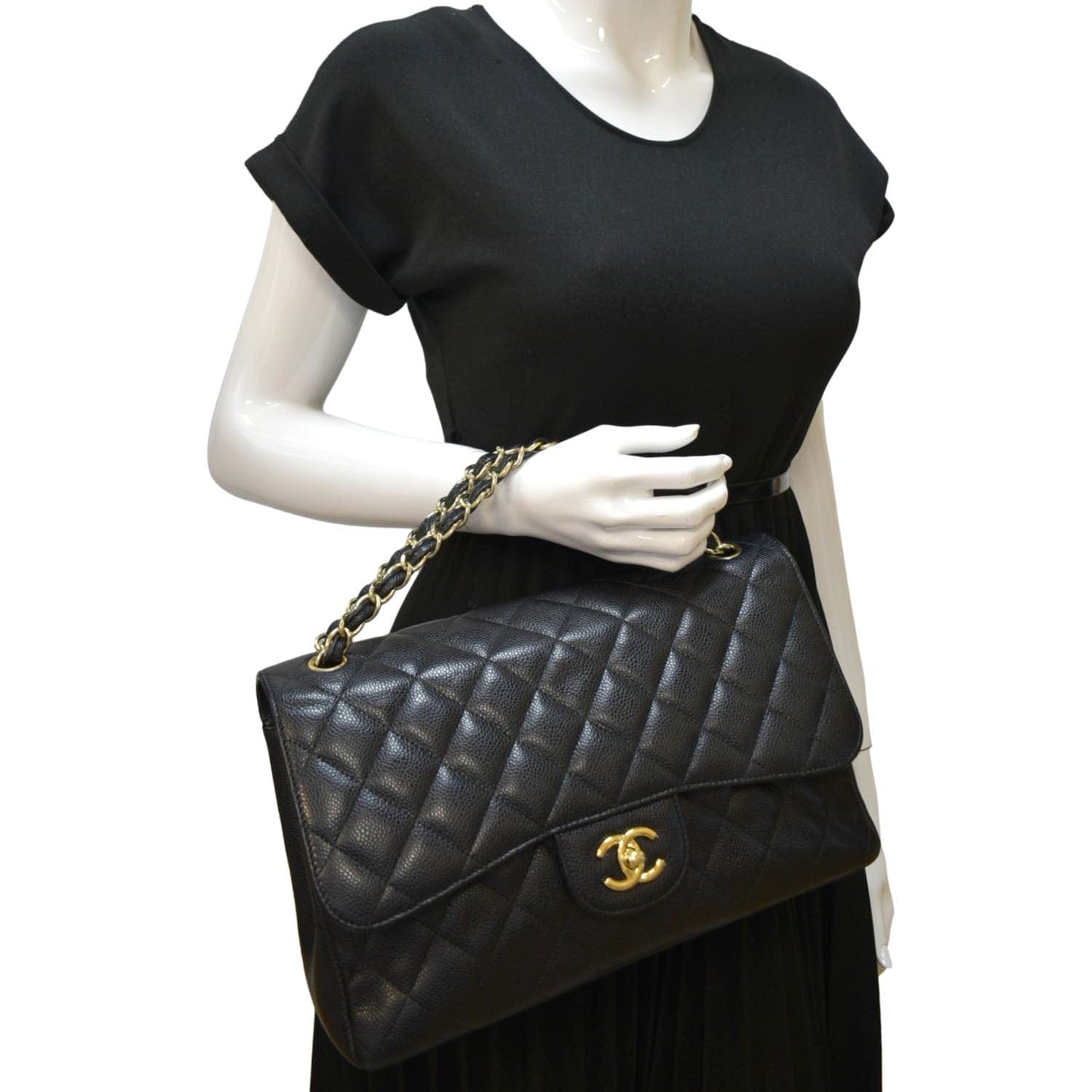 chanel quilted black handbag