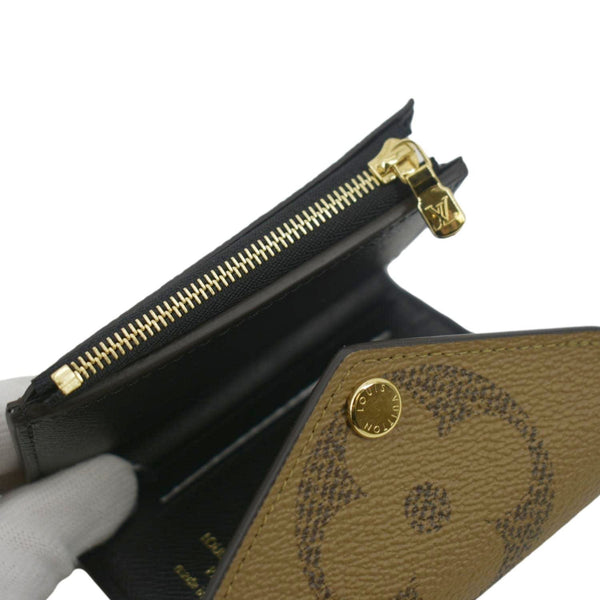 LOUIS VUITTON Zoe Monogram Reverse Canvas Wallet Brown