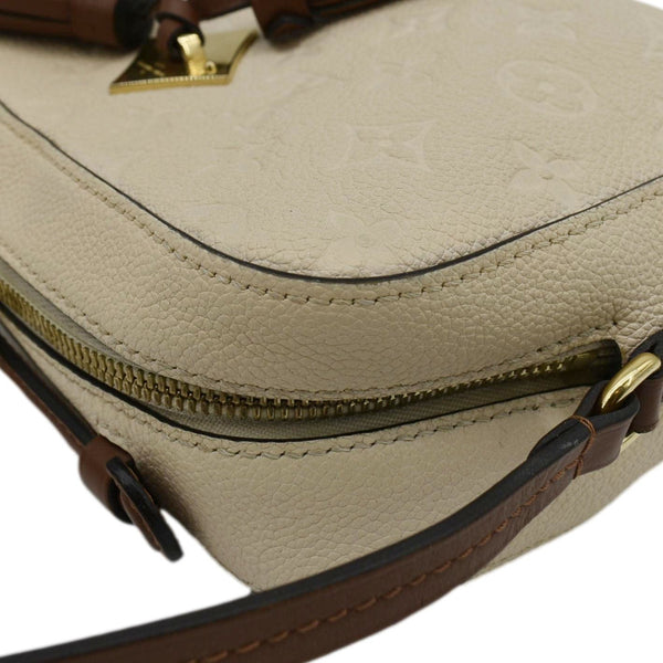 LOUIS VUITTON Saintonge Monogram Empreinte Leather Crossbody Bag Creme