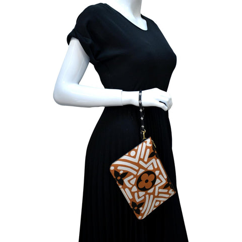 LV Neverfull Crafty Monogram Giant Wristlet Pouch Brown