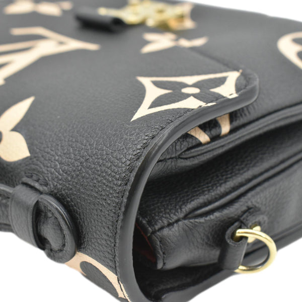 LOUIS VUITTON Pochette Empreinte Leather Crossbody Bag Bicolor upper left corner look 