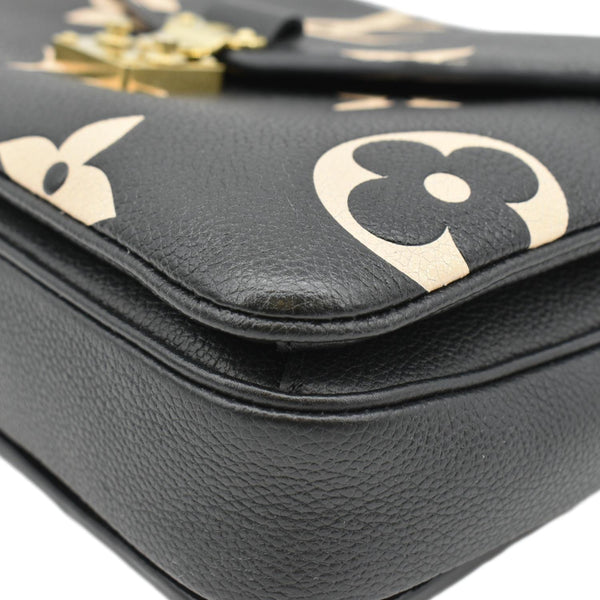 LOUIS VUITTON Pochette Empreinte Leather Crossbody Bag Bicolor lower right corner look