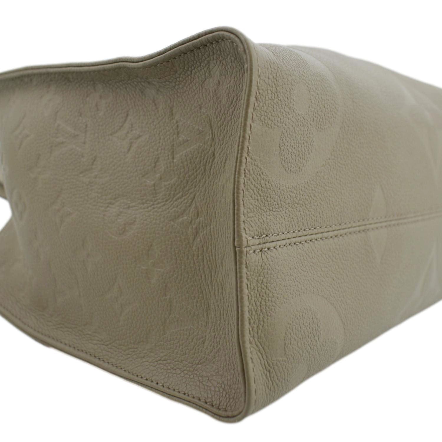 LOUIS VUITTON Onthego MM Tourterelle Cream Monogram Empreinte Leather  Handbag