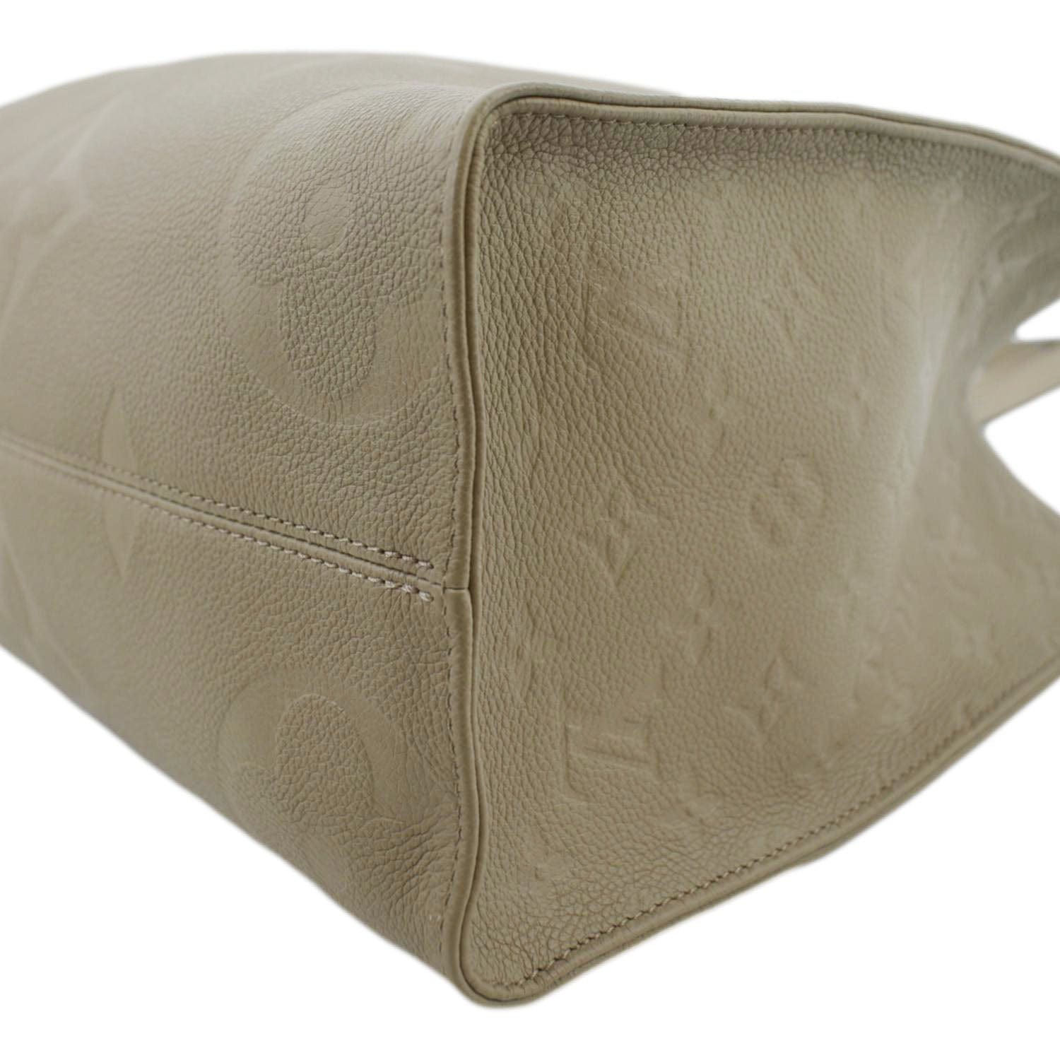 Louis Vuitton Tourterelle Monogram Giant Empreinte Leather Neverfull Bag