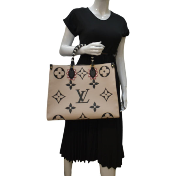 LOUIS VUITTON Onthego GM Crafty Monogram Giant Empreinte Tote Bag Creme