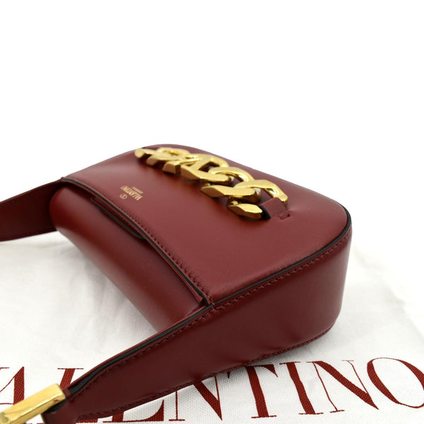 Valentino V Logo Chain Leather Shoulder Bag in Red - Top Left