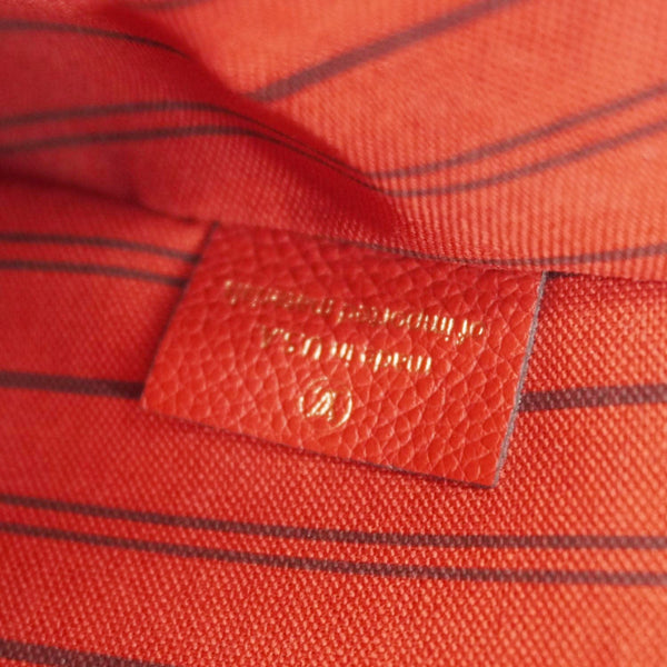 LOUIS VUITTON Metis Pochette Empreinte Leather Crossbody Bag Red