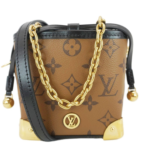 LOUIS VUITTON Noe Monogram Reverse Canvas Crossbody Bag Brown