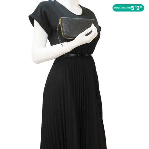 LOUIS VUITTON Clemence Monogram Empreinte Leather Wallet Black