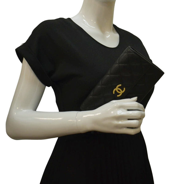 CHANEL Long Flap Quilted Caviar Wallet with model